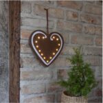 LED Ziemassvētku dekors piparkūka Star Trading Merry, 27cm, 14LED, WW, IP20, 2xAA, ar taimeri